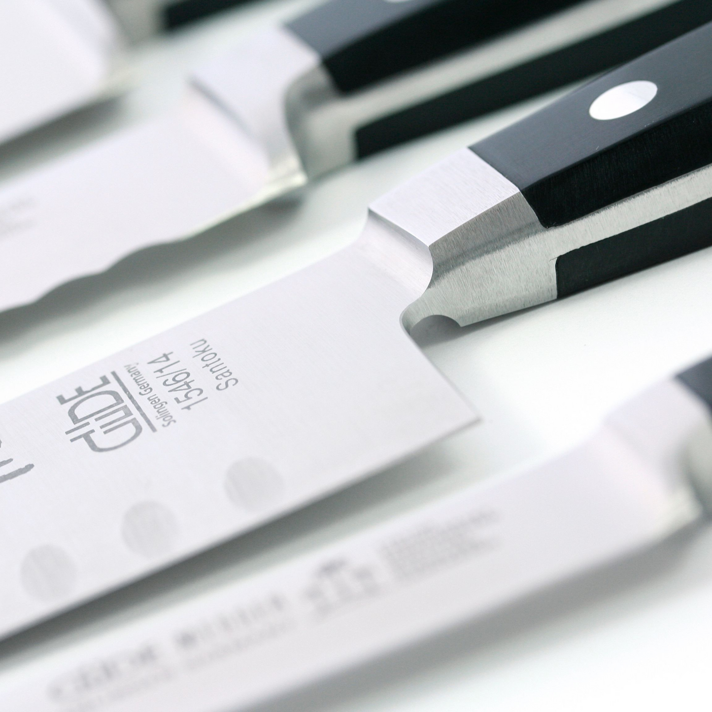 Gude Alpha Series Forged Double Bolster Steak Knife 4 1/2", Black Hostaform Handle and Serrated Blade - GuedeUSA