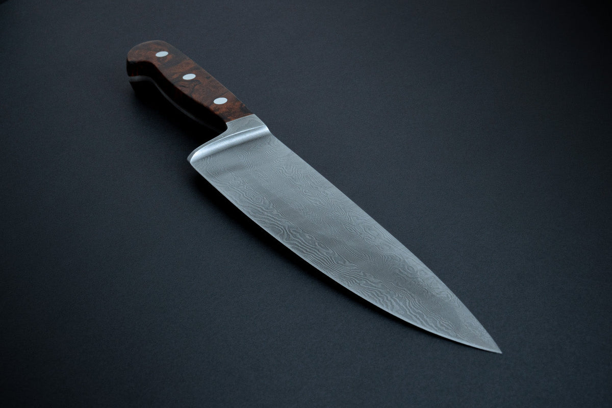 Güde Damascus Steel knives, over 300 forge-welded layers with desert ironwood handles