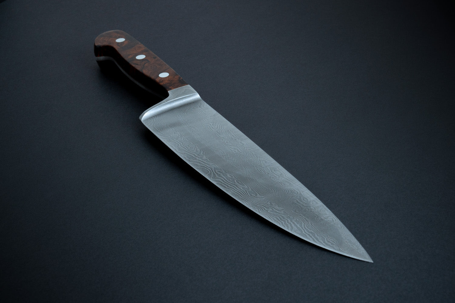 Güde Damascus Steel knives, over 300 forge-welded layers with desert ironwood handles