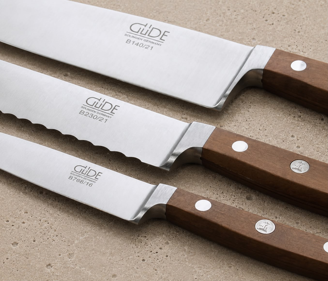 Güde Alpha Pear series, finely textured pear wood handle scales on ice-hardened blades