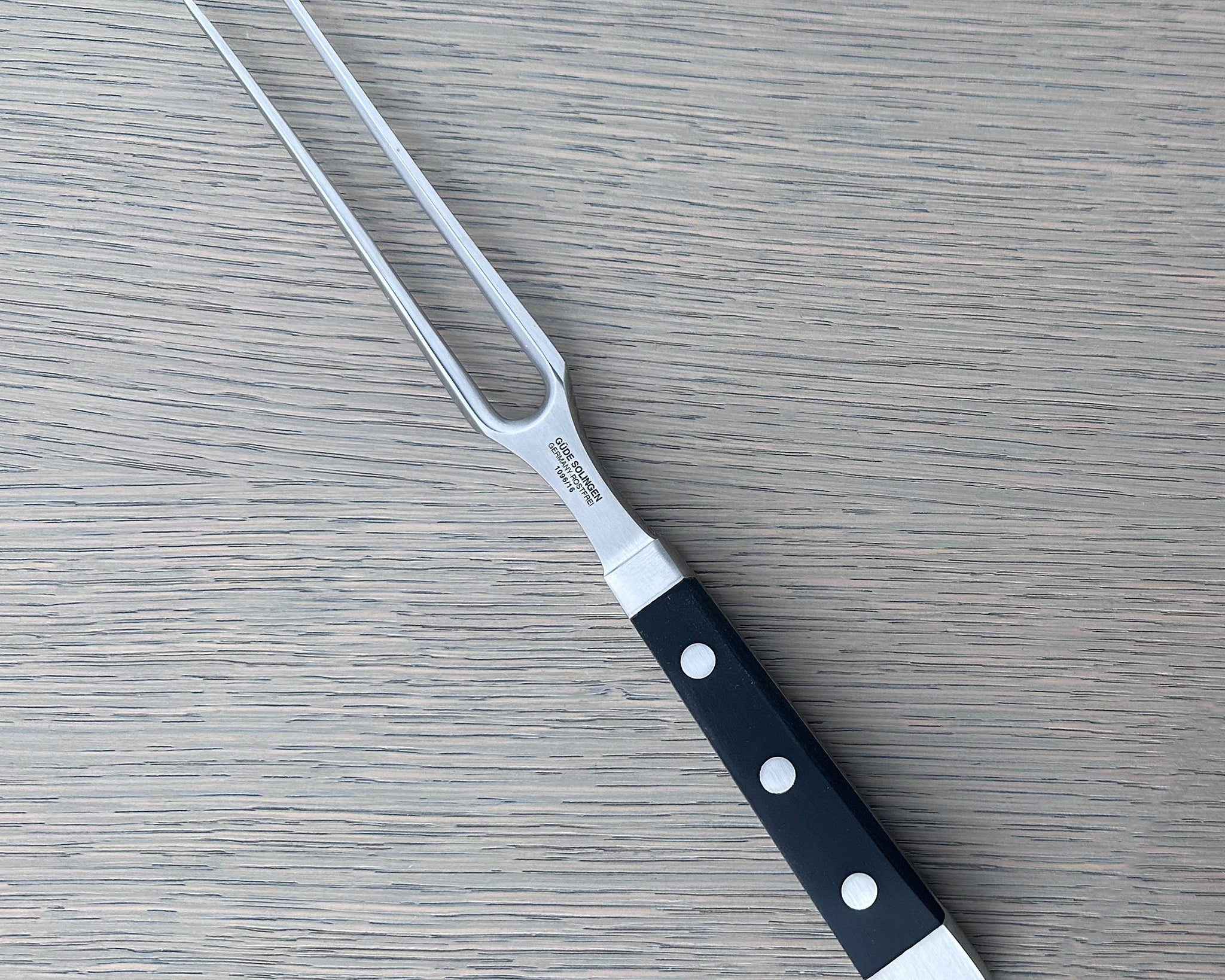 Güde Alpha Meat Fork 6-in with black Hostaform handle, hand-forged in Solingen, Germany