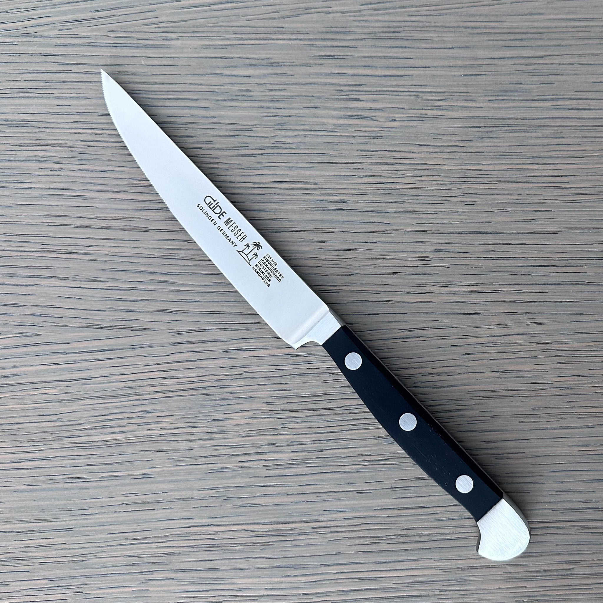 Gude Alpha Series Forged Double Bolster Serrated Steak Knife 4-1/2-in,  Black Hostaform Handle – Gude Shop USA