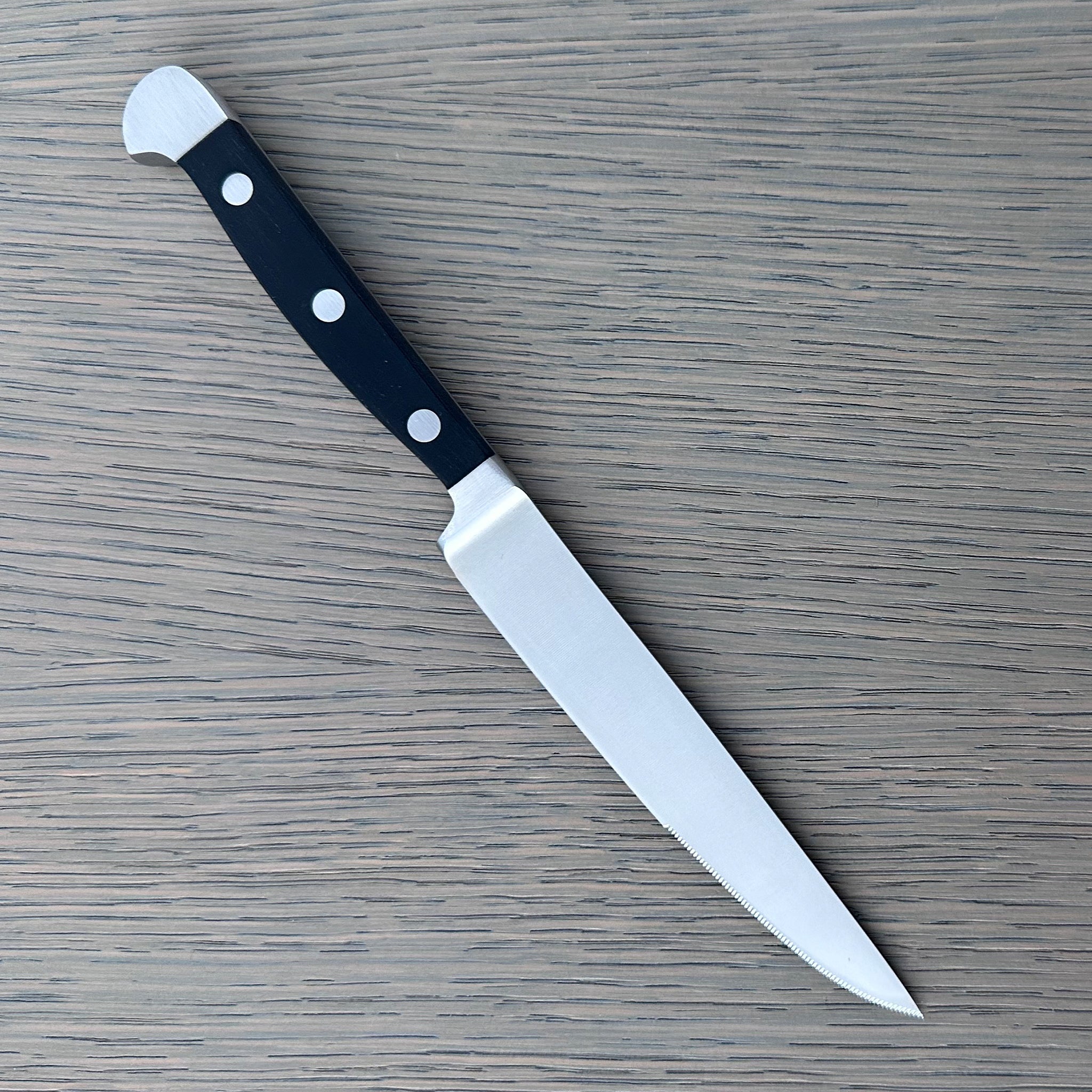 Gude Alpha Series Forged Double Bolster Porterhouse Serrated Steak Knife 4-1/2-in, Black Hostaform Handle – Gude Shop USA