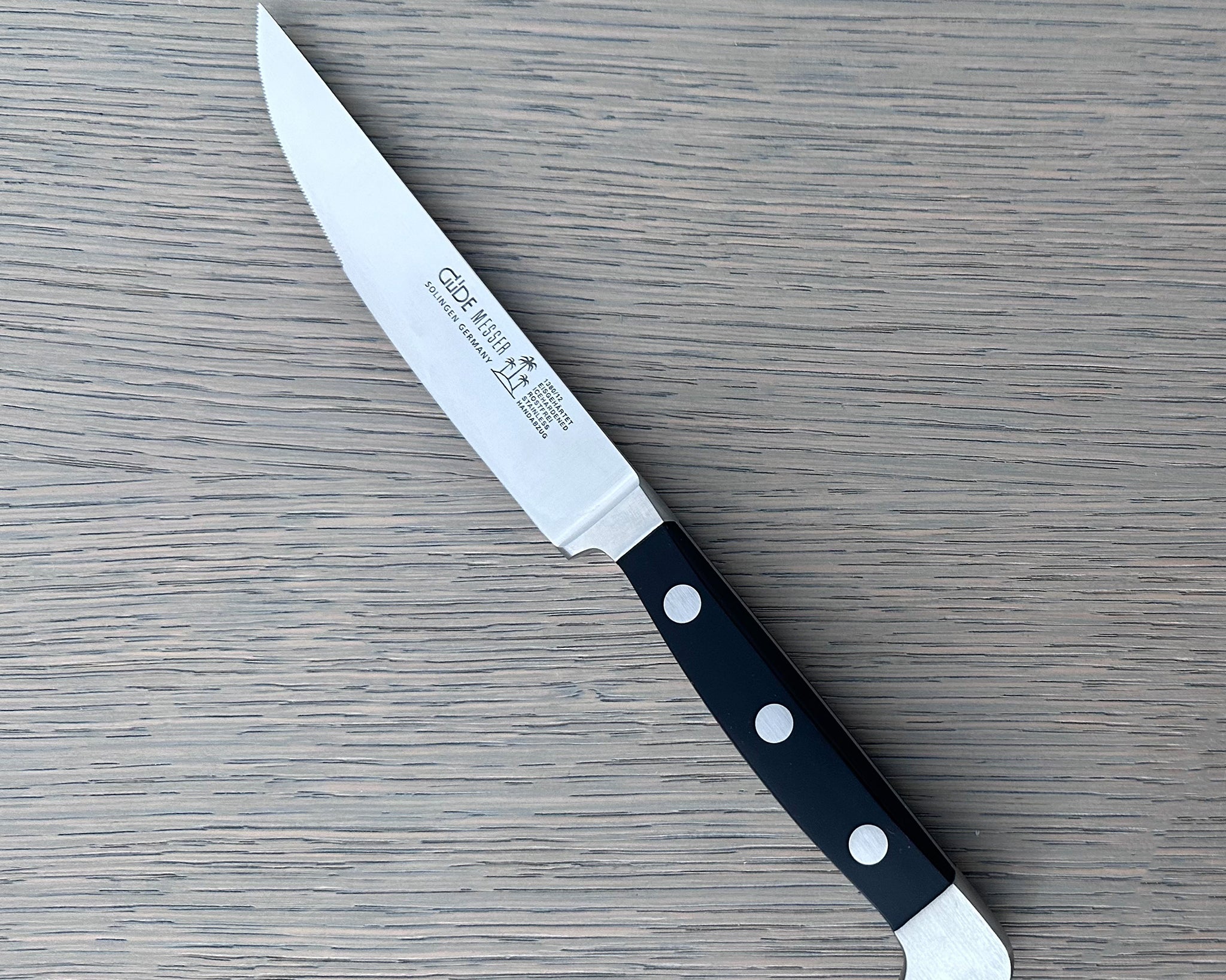 Gude Alpha Series Forged Double Bolster Porterhouse Serrated Steak Knife 4-1/2-in, Black Hostaform Handle – Gude Shop USA