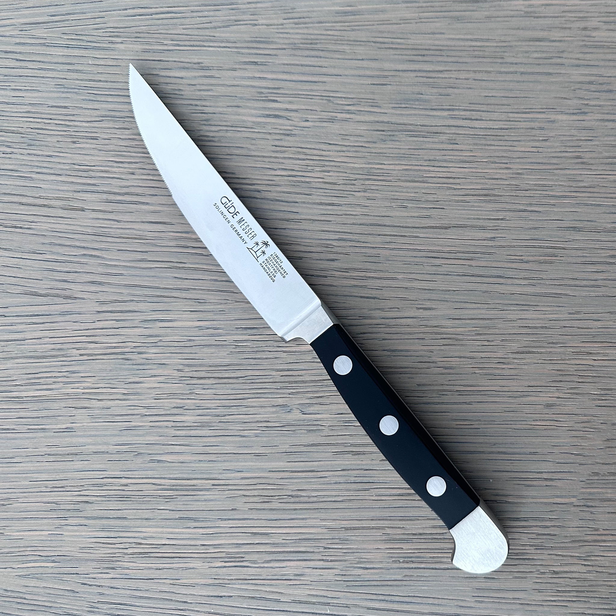 Gude Alpha Series Forged Double Bolster Porterhouse Serrated Steak Knife 4-1/2-in, Black Hostaform Handle – Gude Shop USA