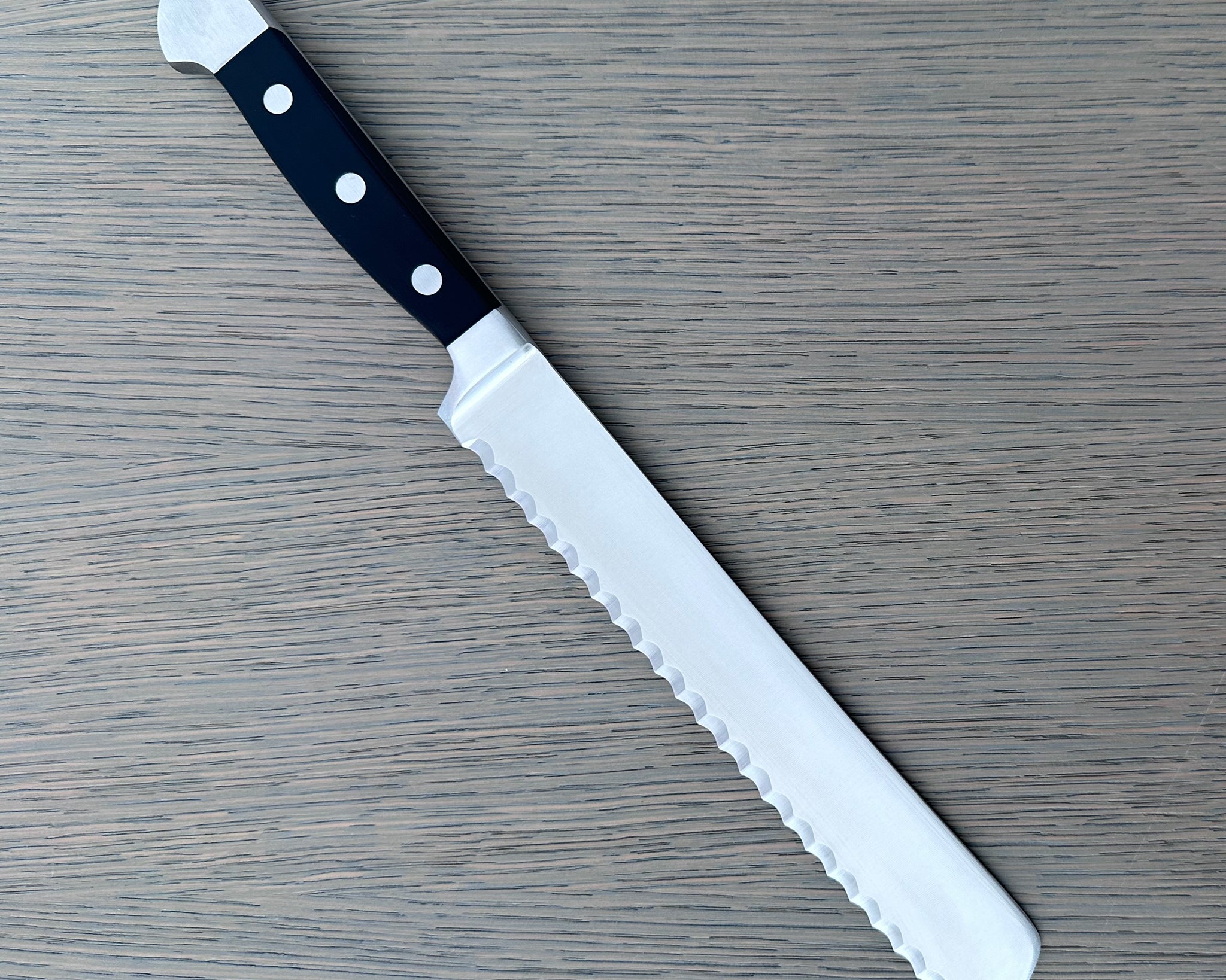 Gude Alpha Series Forged Double Bolster Serrated Bread Knife 8-in, Black Hostaform Handle – Gude Shop USA