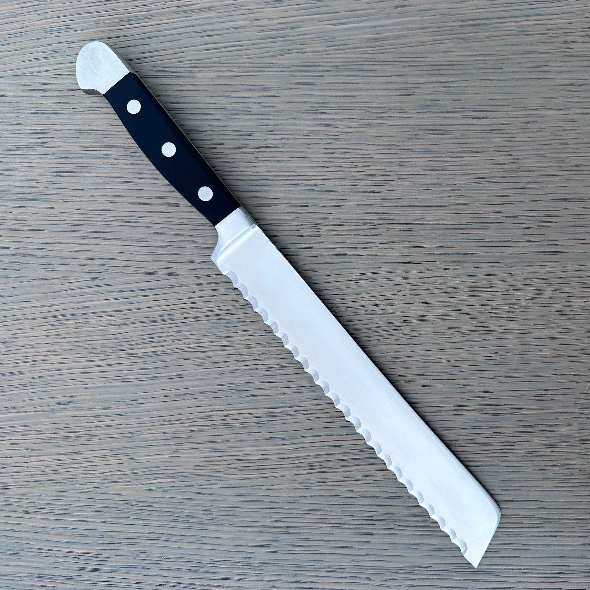 Gude Alpha Series Forged Double Bolster Serrated Bread Knife 8-in, Black Hostaform Handle – Gude Shop USA