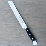Gude Alpha Series Forged Double Bolster Serrated Bread Knife 8-in, Black Hostaform Handle – Gude Shop USA