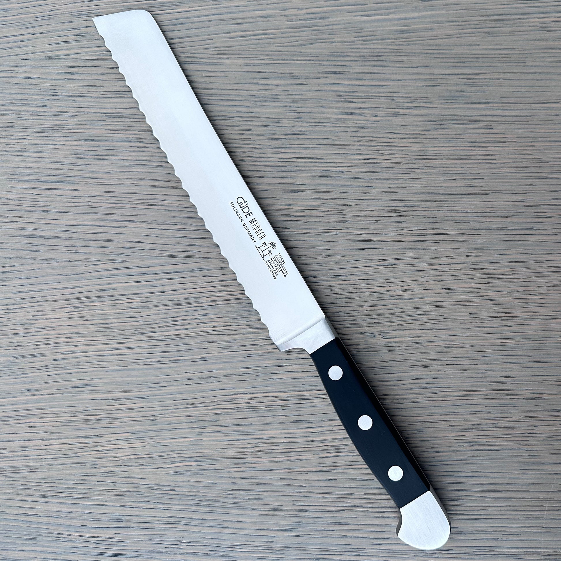 Gude Alpha Series Forged Double Bolster Serrated Bread Knife 8-in, Black Hostaform Handle – Gude Shop USA