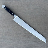 Gude Alpha Series Forged Double Bolster Serrated Bread Knife 12-in, Black Hostaform Handle – Gude Shop USA