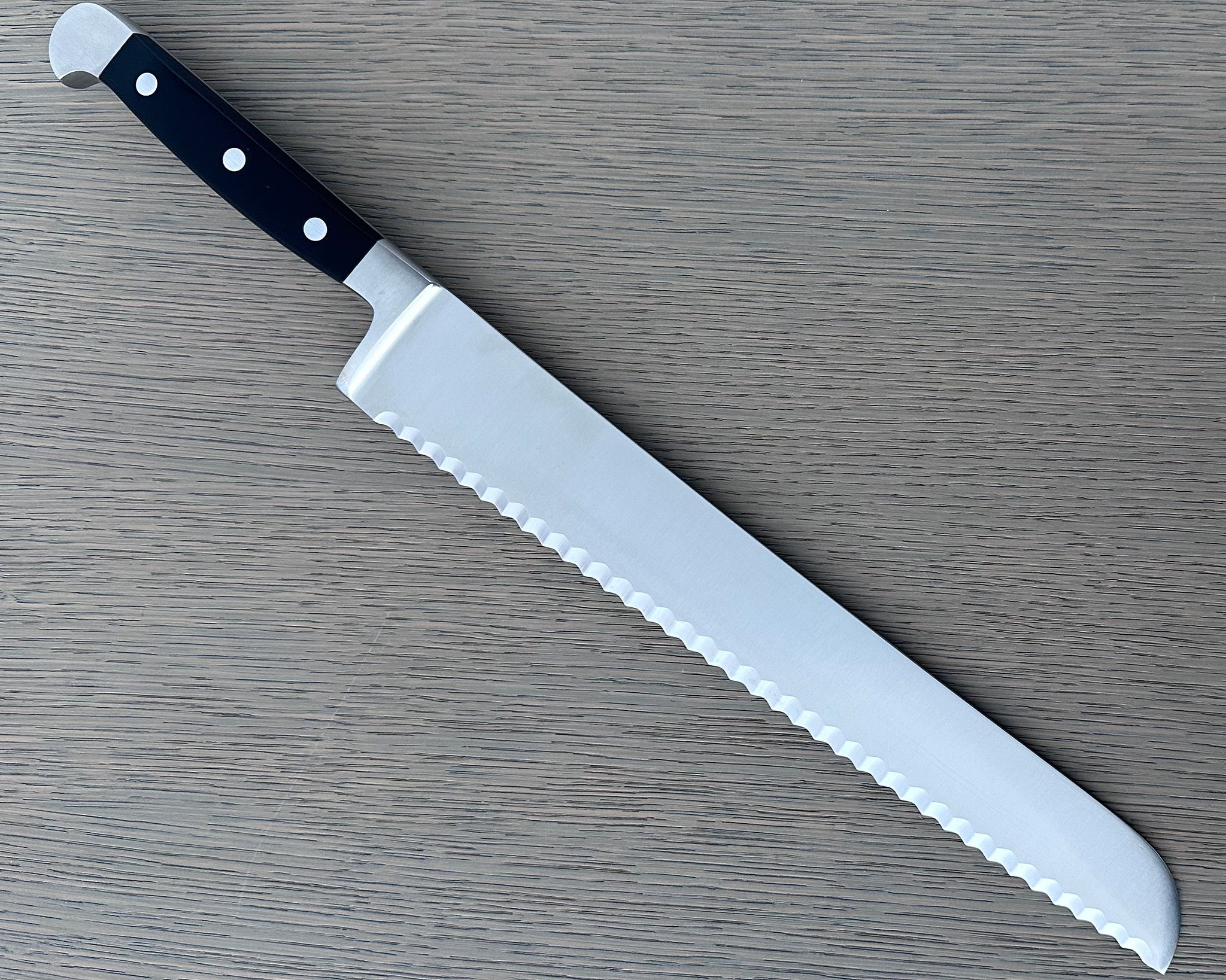 Gude Alpha Series Forged Double Bolster Serrated Bread Knife 12-in, Black Hostaform Handle – Gude Shop USA