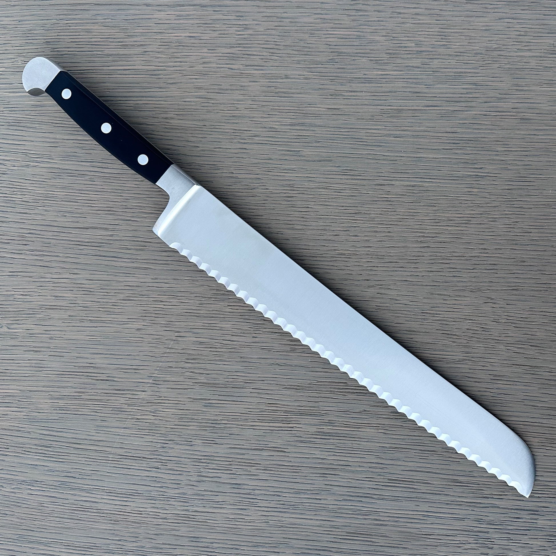 Gude Alpha Series Forged Double Bolster Serrated Bread Knife 12-in, Black Hostaform Handle – Gude Shop USA