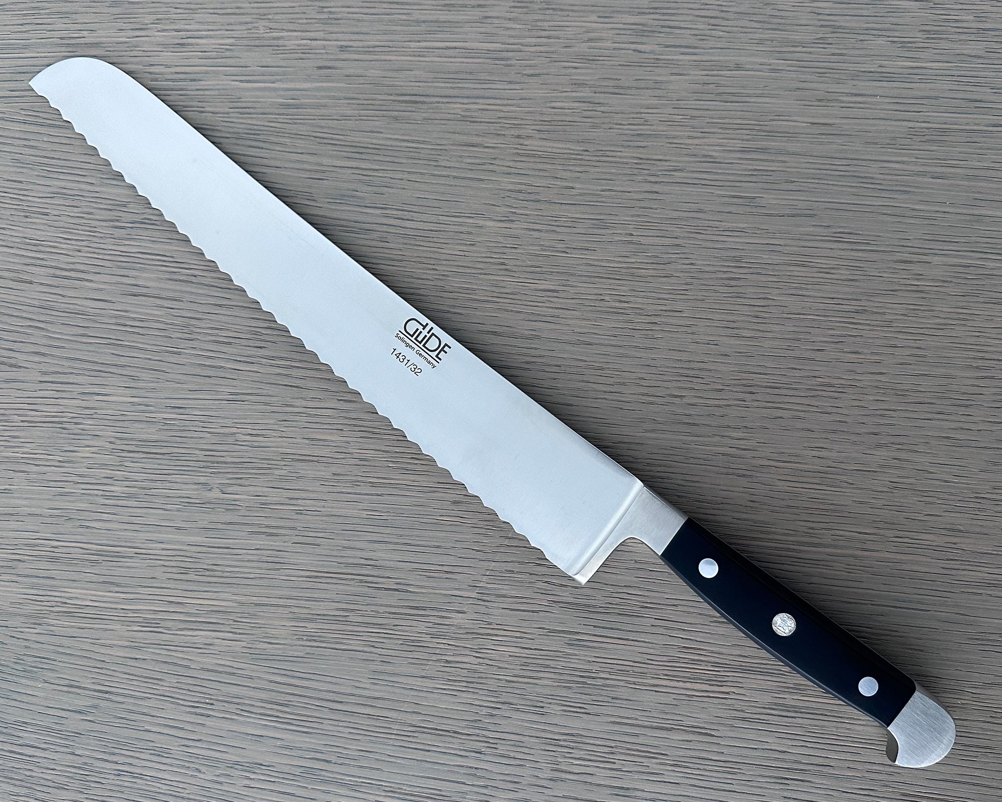 Gude Alpha Series Forged Double Bolster Serrated Bread Knife 12-in, Black Hostaform Handle – Gude Shop USA
