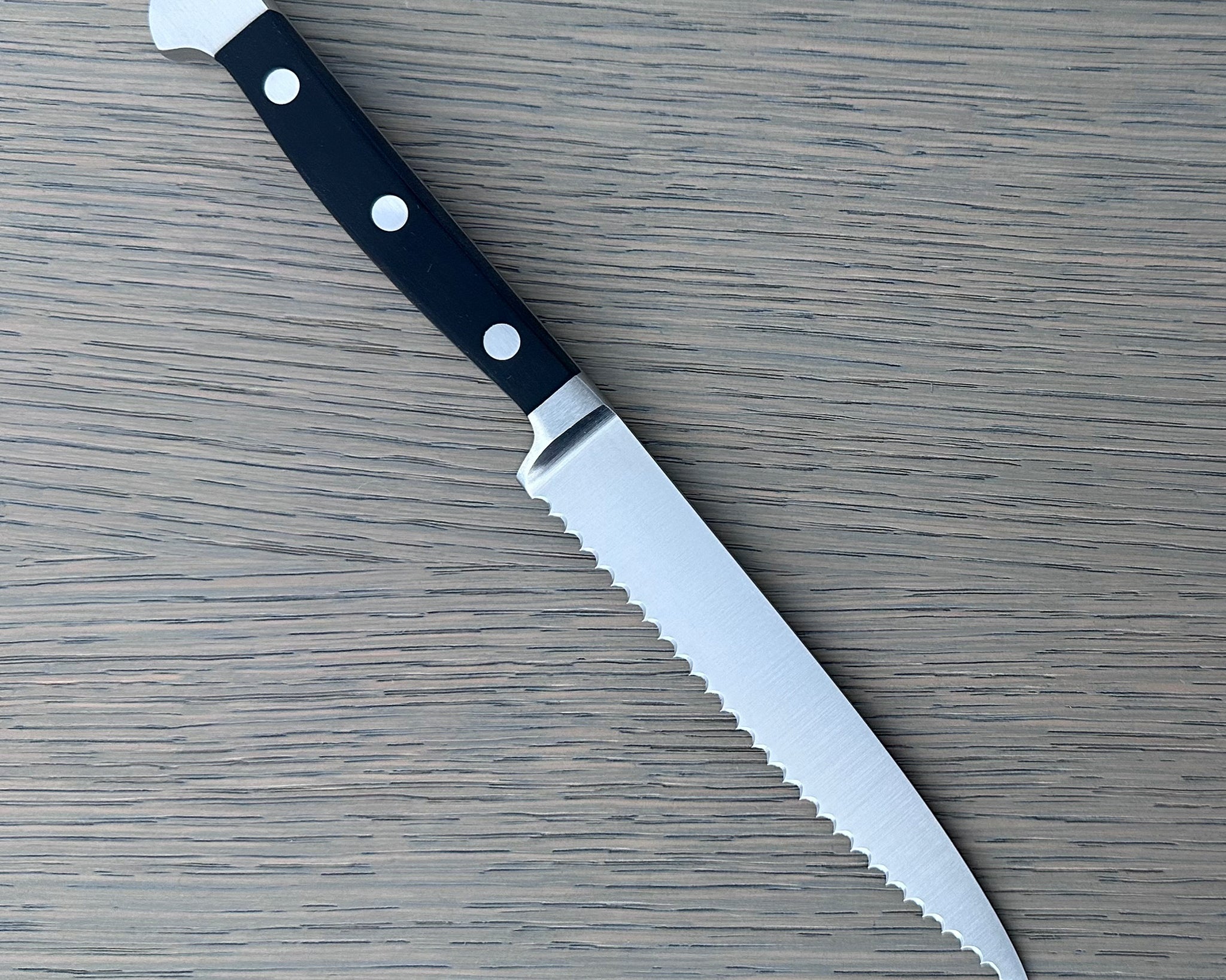 Gude Alpha Series Forged Double Bolster Serrated Tomato Knife 5-in, Black Hostaform Handle – Gude Shop USA