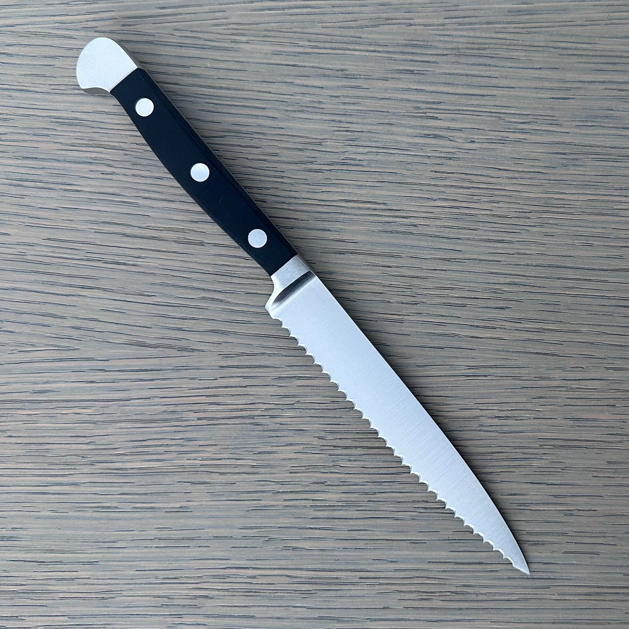 Gude Alpha Series Forged Double Bolster Serrated Tomato Knife 5-in, Black Hostaform Handle – Gude Shop USA
