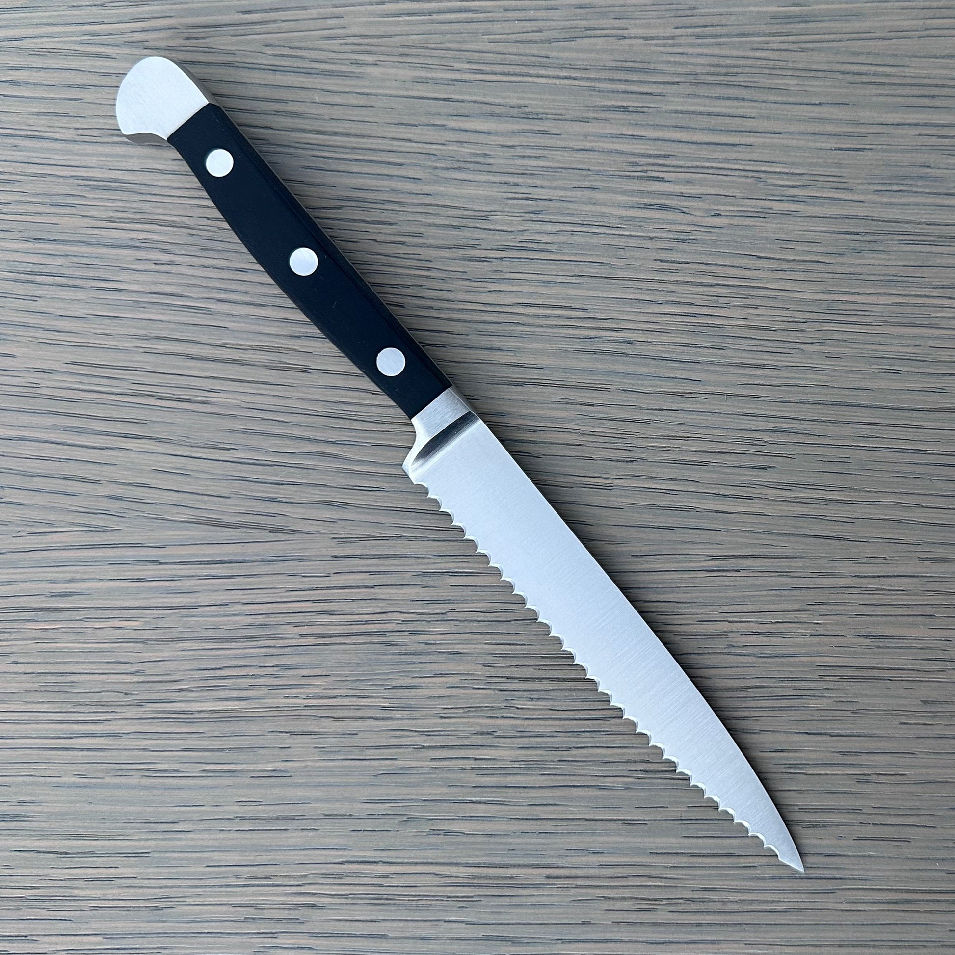 Gude Alpha Series Forged Double Bolster Serrated Tomato Knife 5-in, Black Hostaform Handle – Gude Shop USA