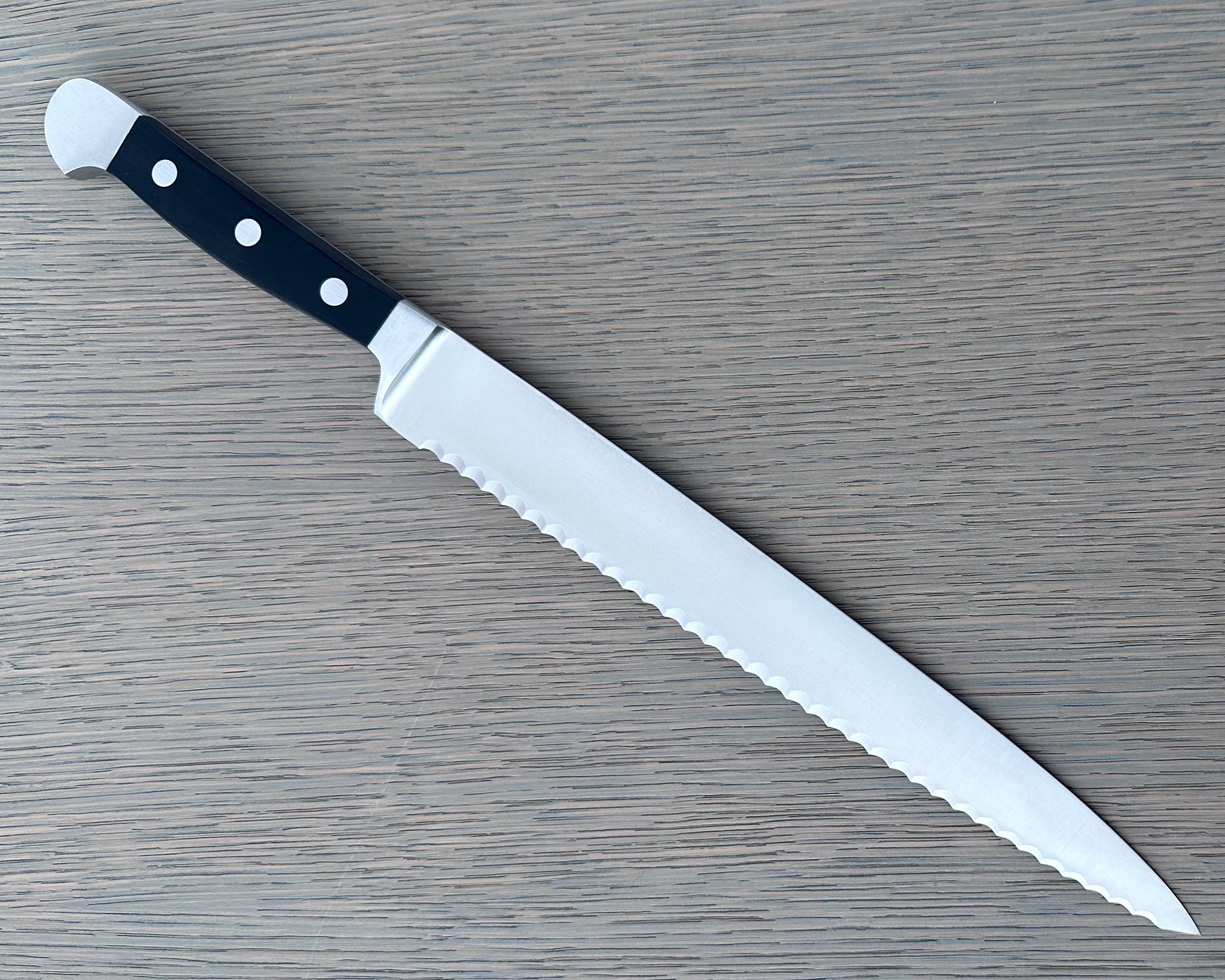 Gude Alpha Series Forged  Double Bolster Serrated Slicer / Roast Beef Knife 10-in, Black Hostaform Handle – Gude Shop USA