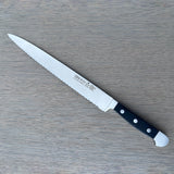 Gude Alpha Series Forged  Double Bolster Serrated Slicer / Roast Beef Knife 10-in, Black Hostaform Handle – Gude Shop USA