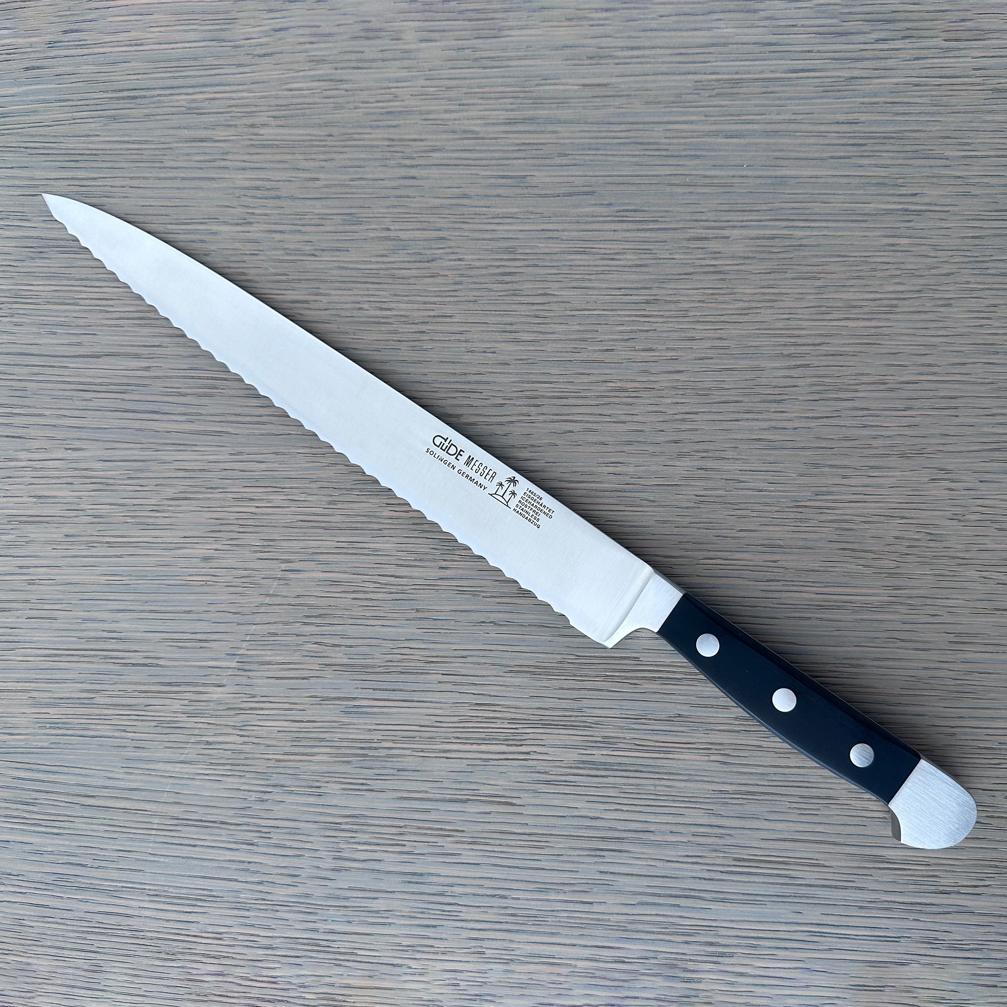 Gude Alpha Series Forged  Double Bolster Serrated Slicer / Roast Beef Knife 10-in, Black Hostaform Handle – Gude Shop USA
