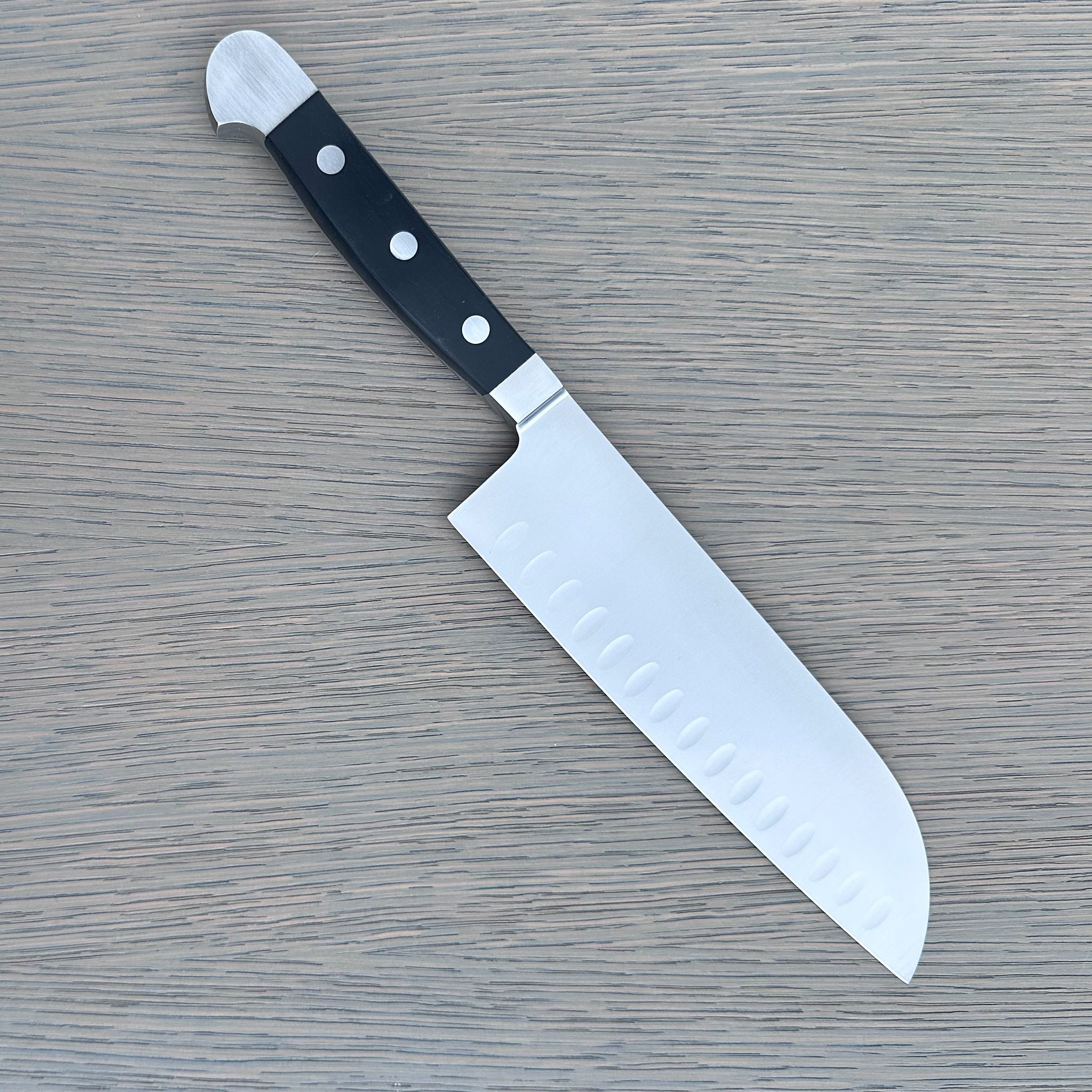 Gude Alpha Series Forged Double Bolster Hollow Edge Santoku Knife 7-in, Black Hostaform Handle – Gude Shop USA
