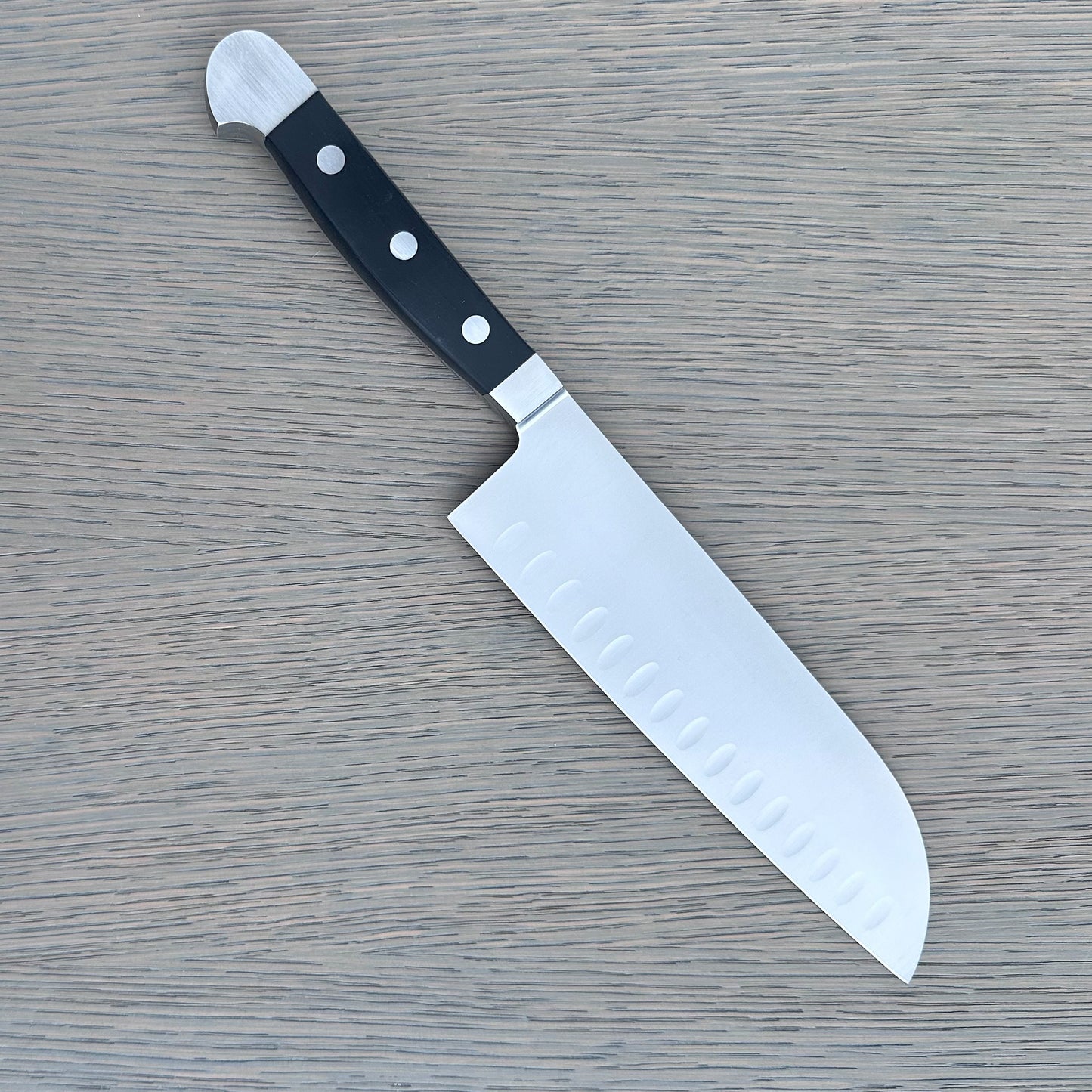 Gude Alpha Series Forged Double Bolster Hollow Edge Santoku Knife 7-in, Black Hostaform Handle – Gude Shop USA