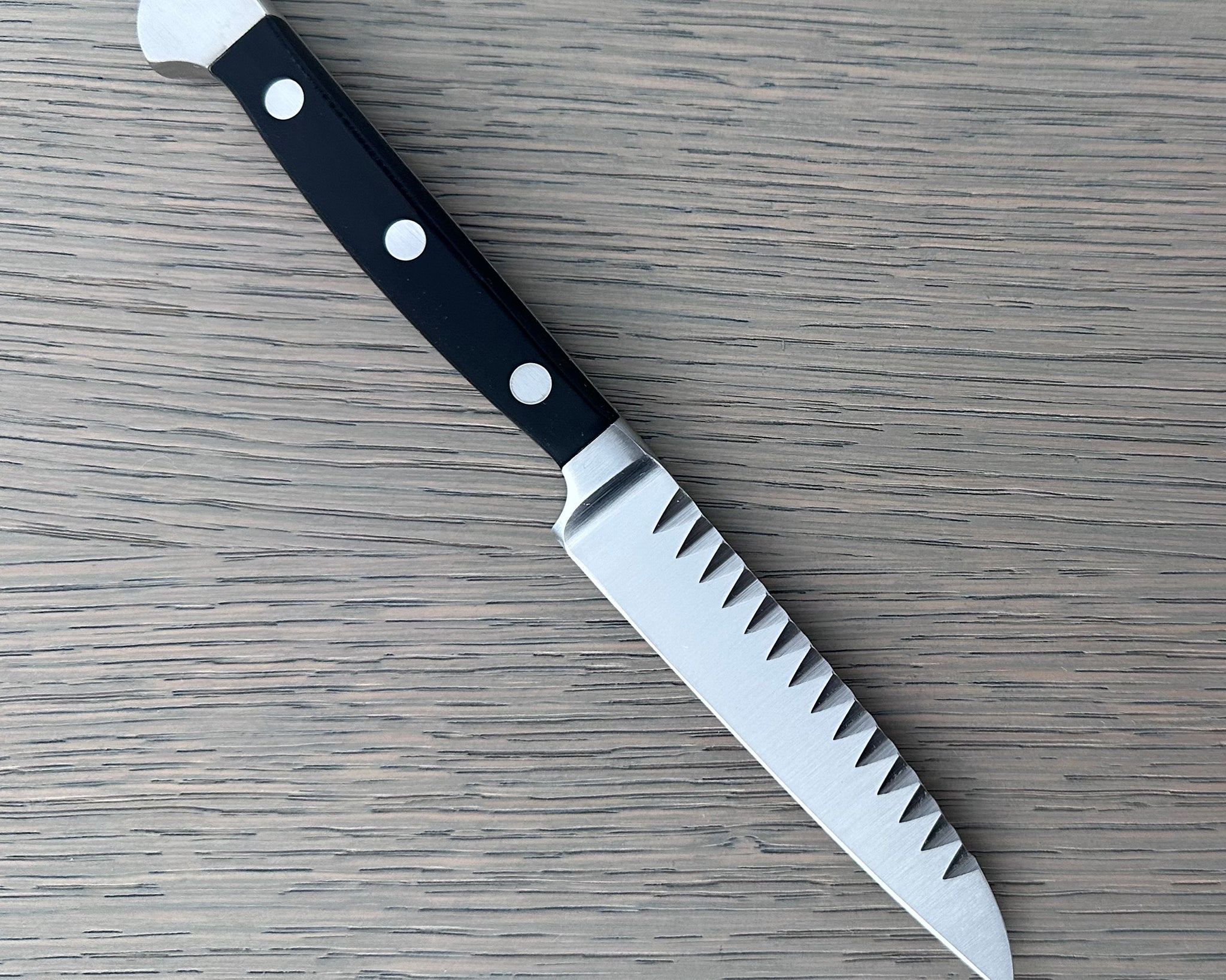 Güde Alpha Series Decorating Knife 3.5-inch, forged from a single bar of steel for a harder, thicker blade