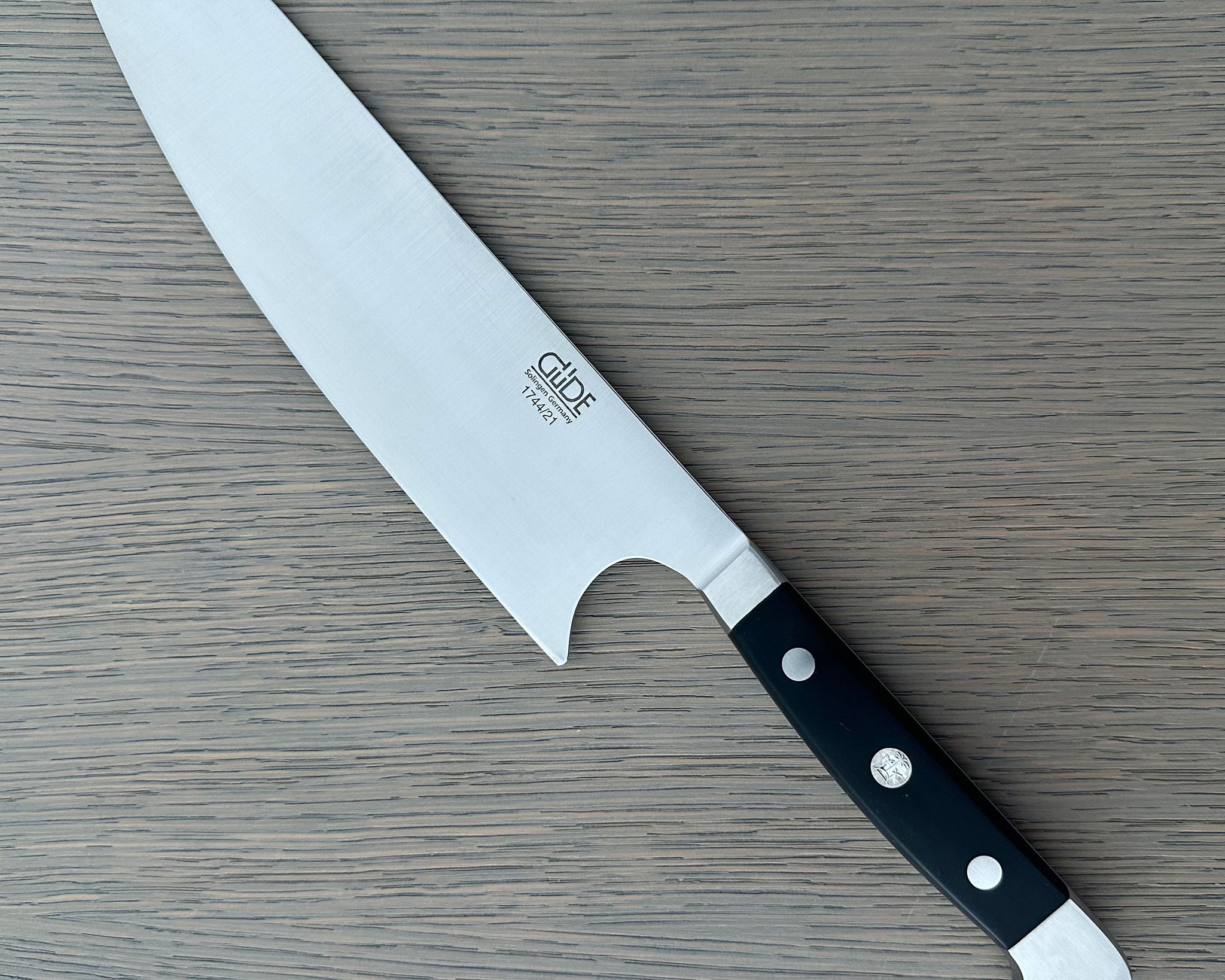 Güde Alpha Kiritsuke Chef's Knife 8.26-in with black Hostaform handle, hand-forged in Solingen, Germany