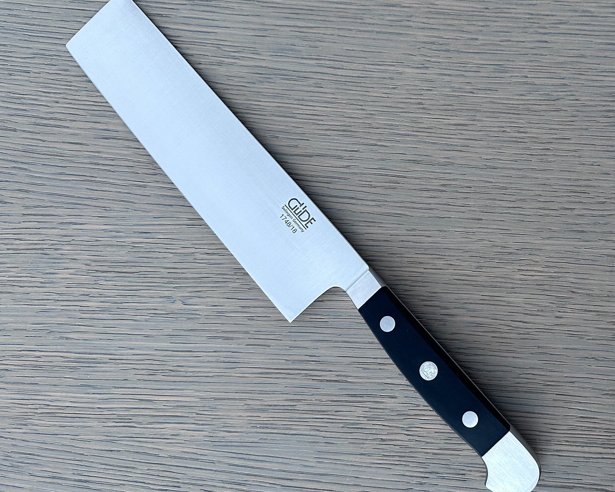 Güde Alpha Nakiri Vegetable Knife 7-in with black Hostaform handle, hand-forged in Solingen, Germany