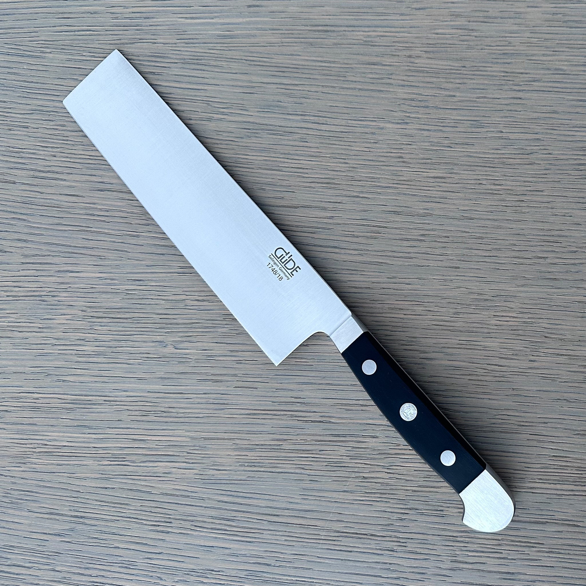 Güde Alpha Nakiri Vegetable Knife 7-in with black Hostaform handle, hand-forged in Solingen, Germany