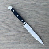 Güde Alpha Series 5-inch Utility Knife, forged blade and black Hostaform handle for daily prep