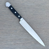 Güde Alpha Series Carving Knife 8-inch, forged from a single bar of steel for a harder, thicker blade