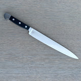 Güde Alpha Series 10-inch slicing knife with black Hostaform handle