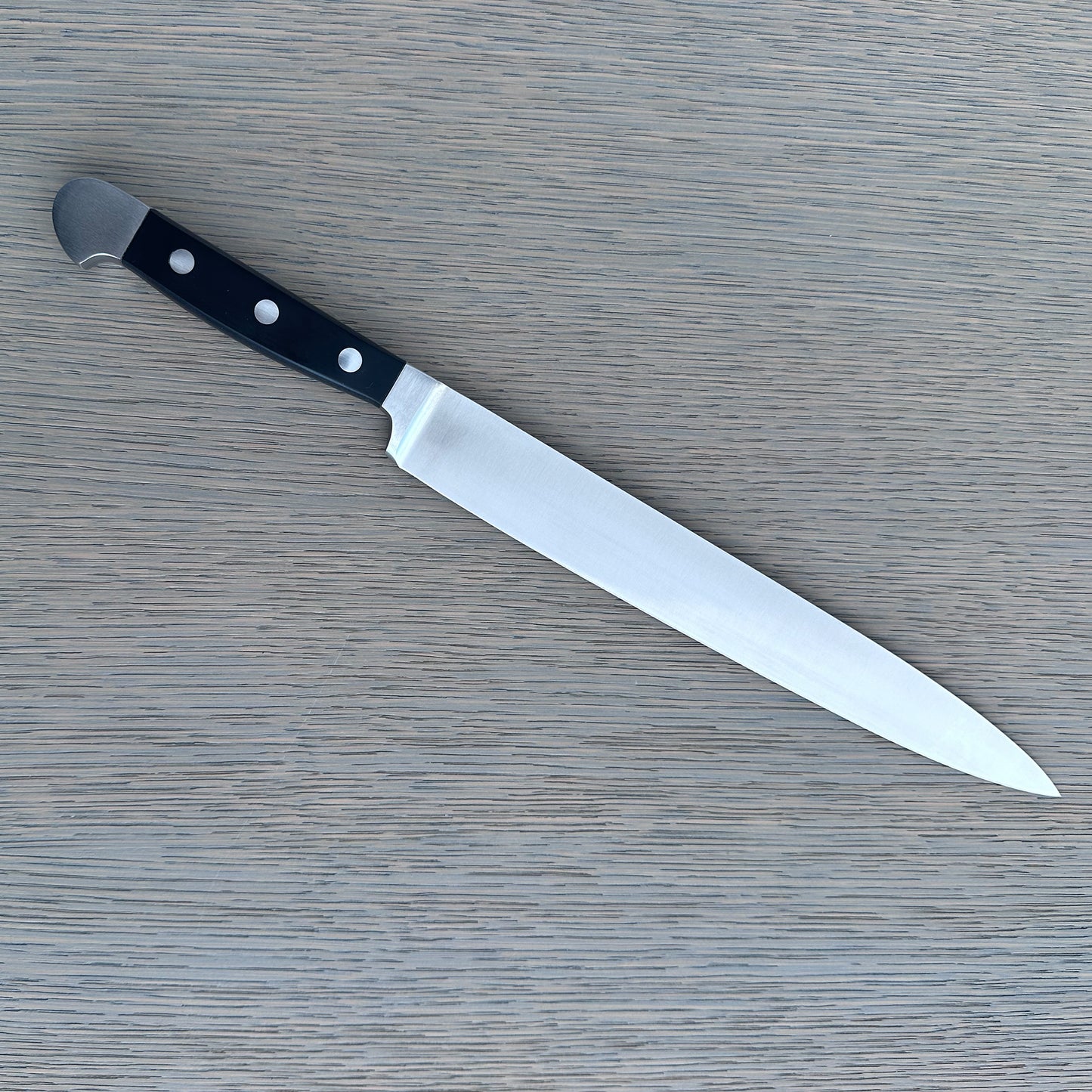 Gude Alpha Series Forged Double Bolster Slicing Knife 10-in, Black Hostaform Handle – Gude Shop USA