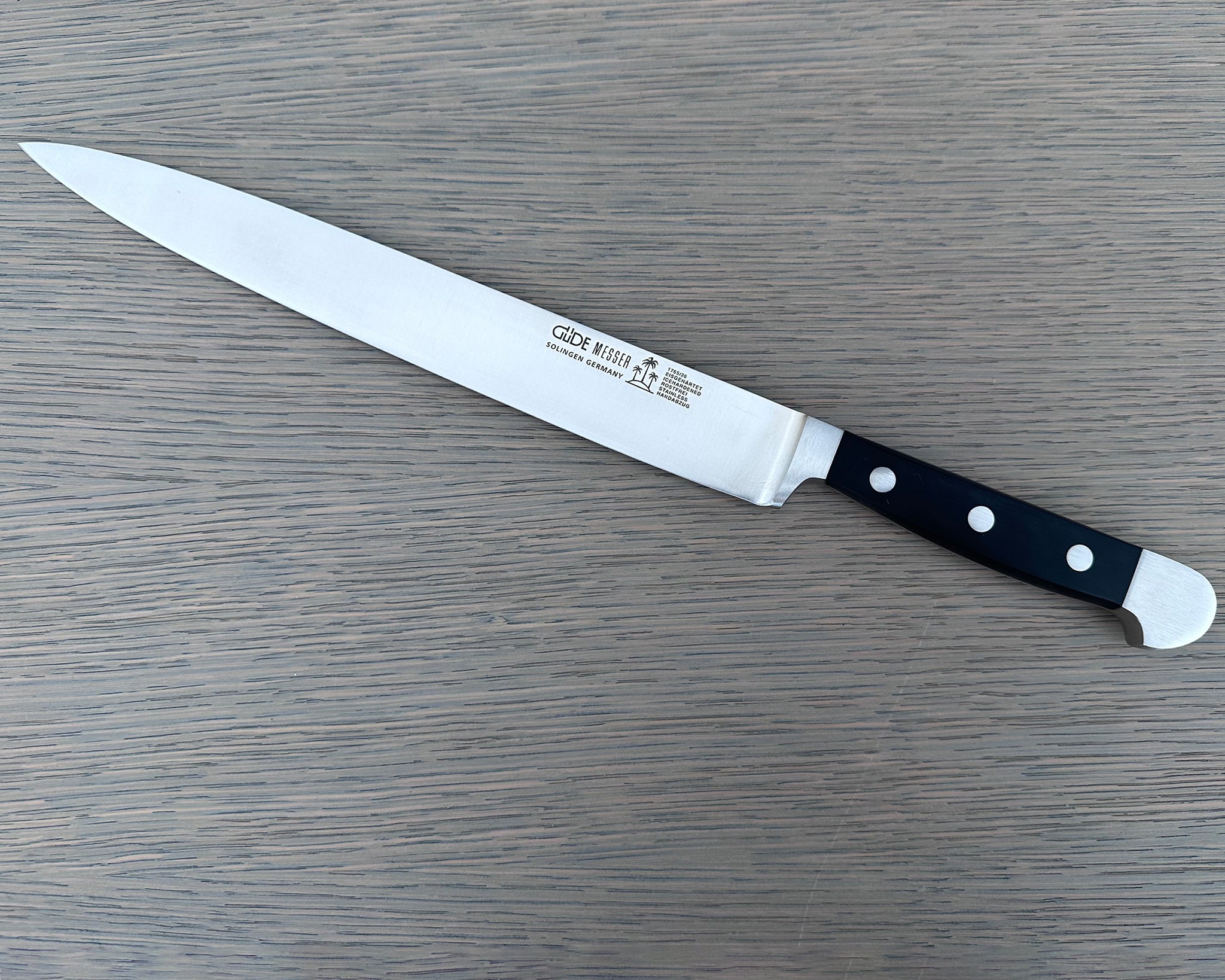 Güde Alpha Slicing Knife 10-in with black Hostaform handle, hand-forged in Solingen, Germany