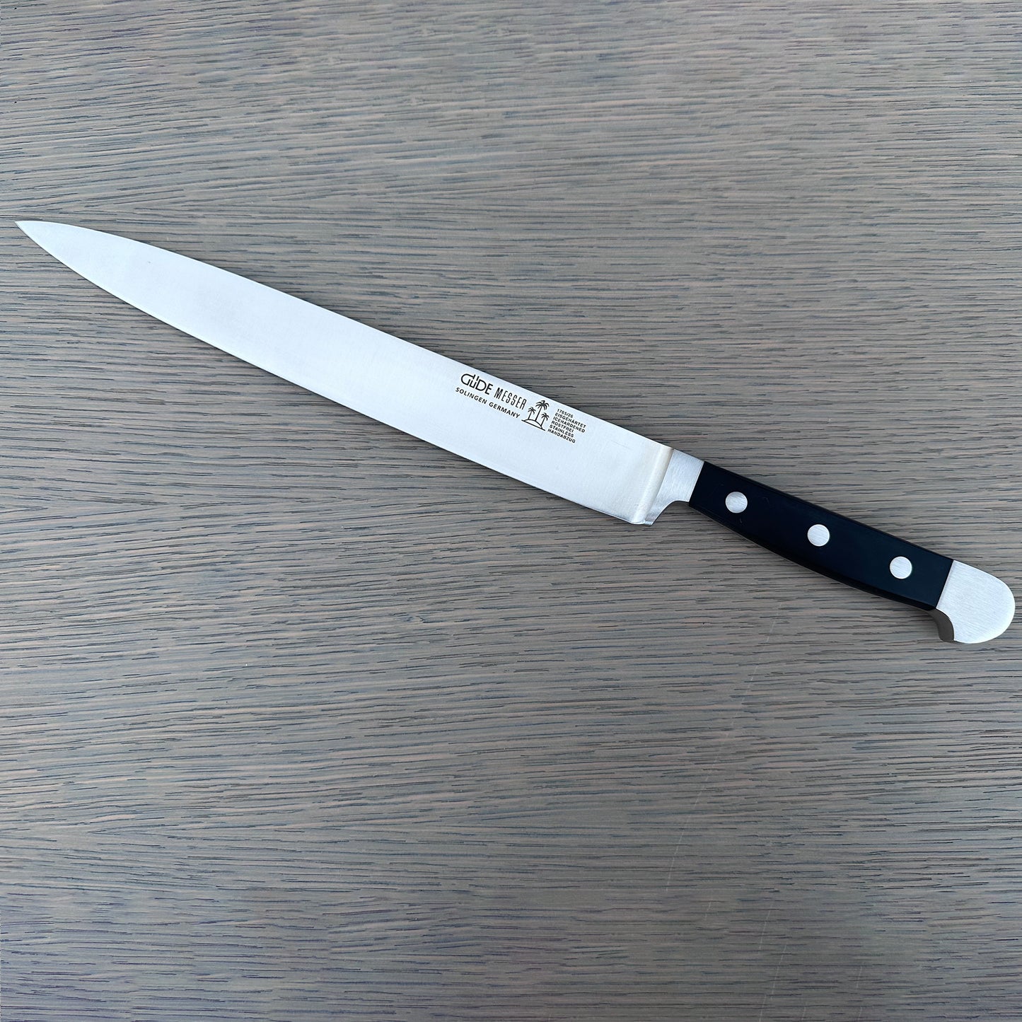 Gude Alpha Series Forged Double Bolster Slicing Knife 10-in, Black Hostaform Handle – Gude Shop USA