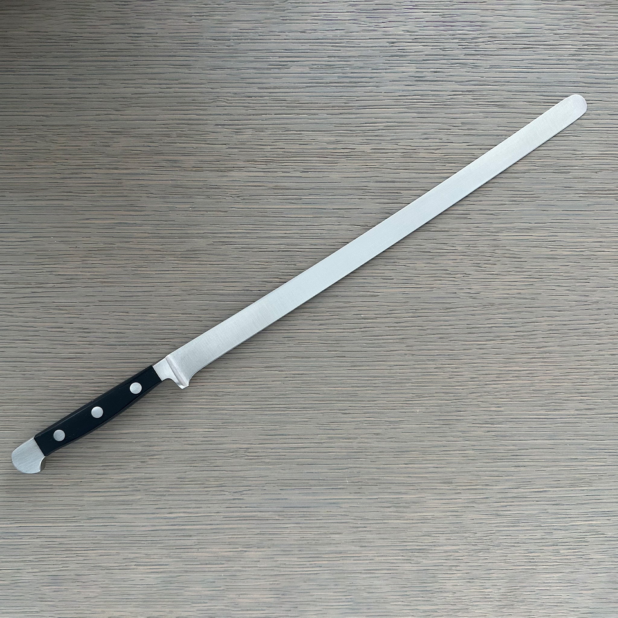 Güde Alpha Series Salmon Slicer 12-inch, forged from a single bar of steel for a harder, thicker blade