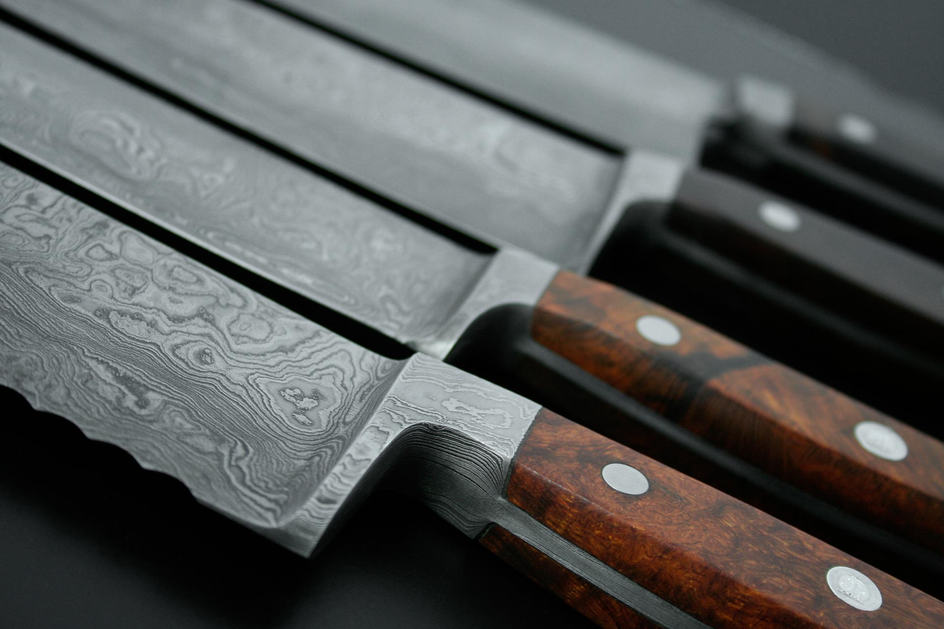 Güde Franz Güde Series 12.5-inch Damascus steel bread knife, hand-wash desert ironwood handle shaped for a comfortable grip