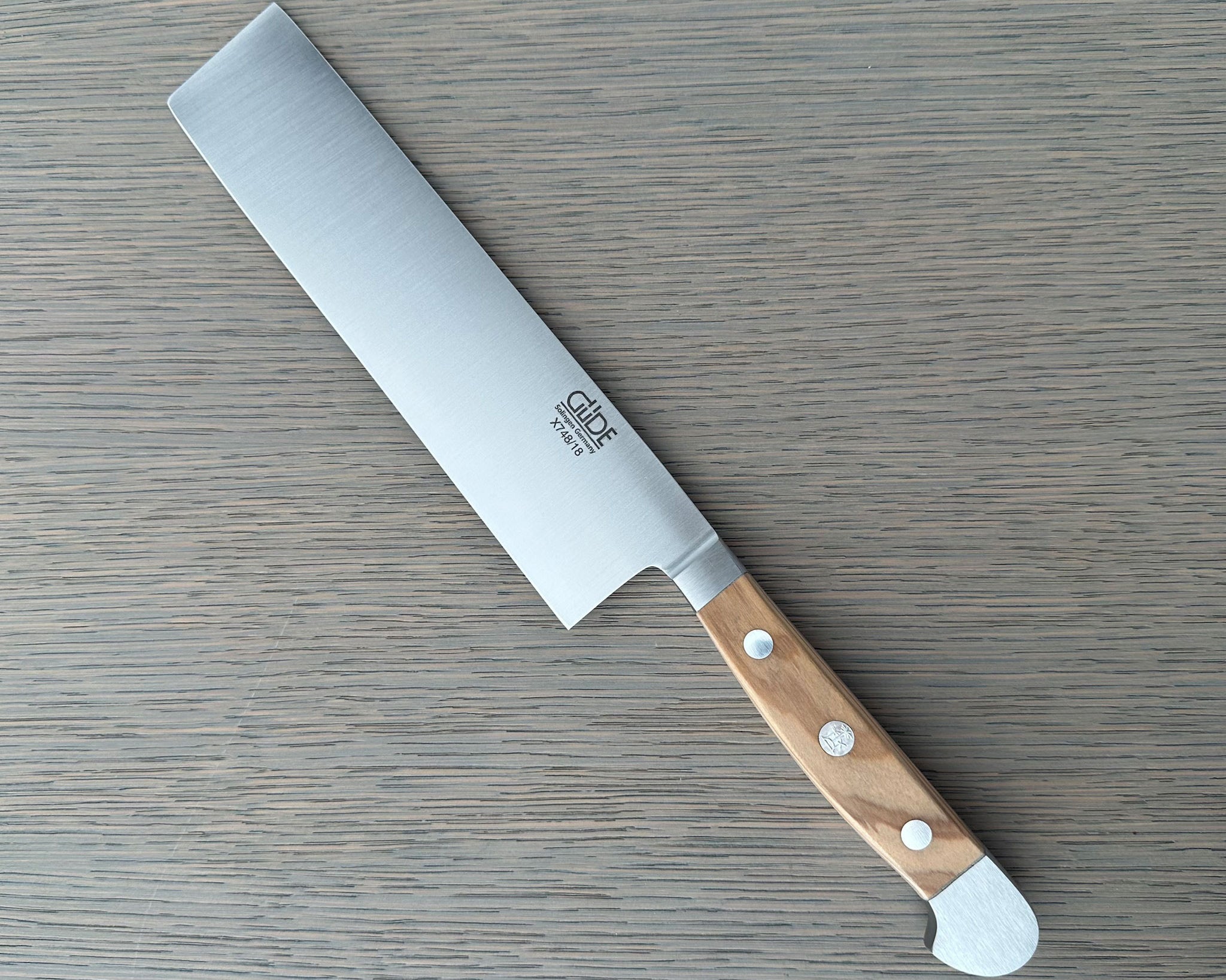 Güde Alpha Olive Nakiri Vegetable Knife 7-in with olive wood handle, hand-forged in Solingen, Germany
