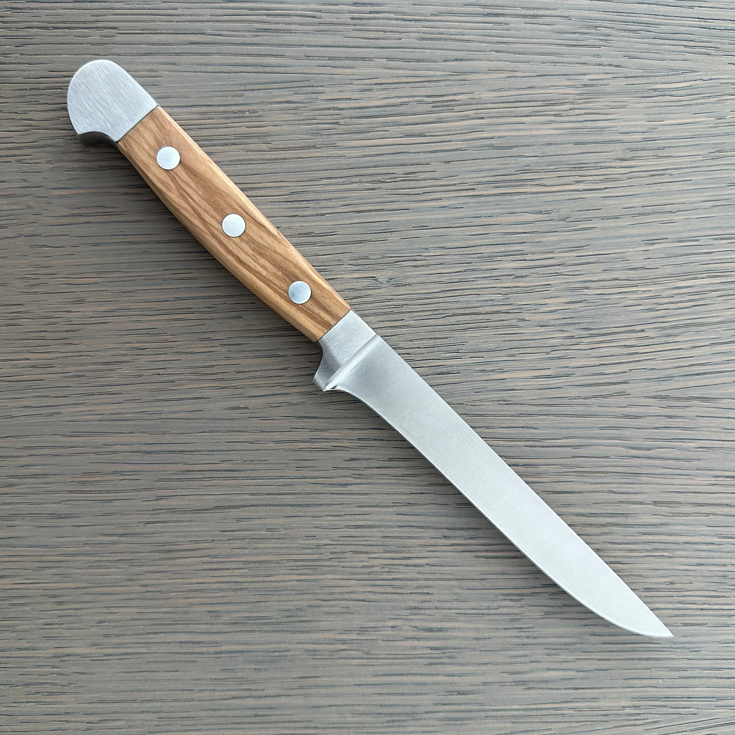 Gude Alpha Olive Series Forged Double Bolster Flexible Boning Knife 5-in, Olivewood Handle