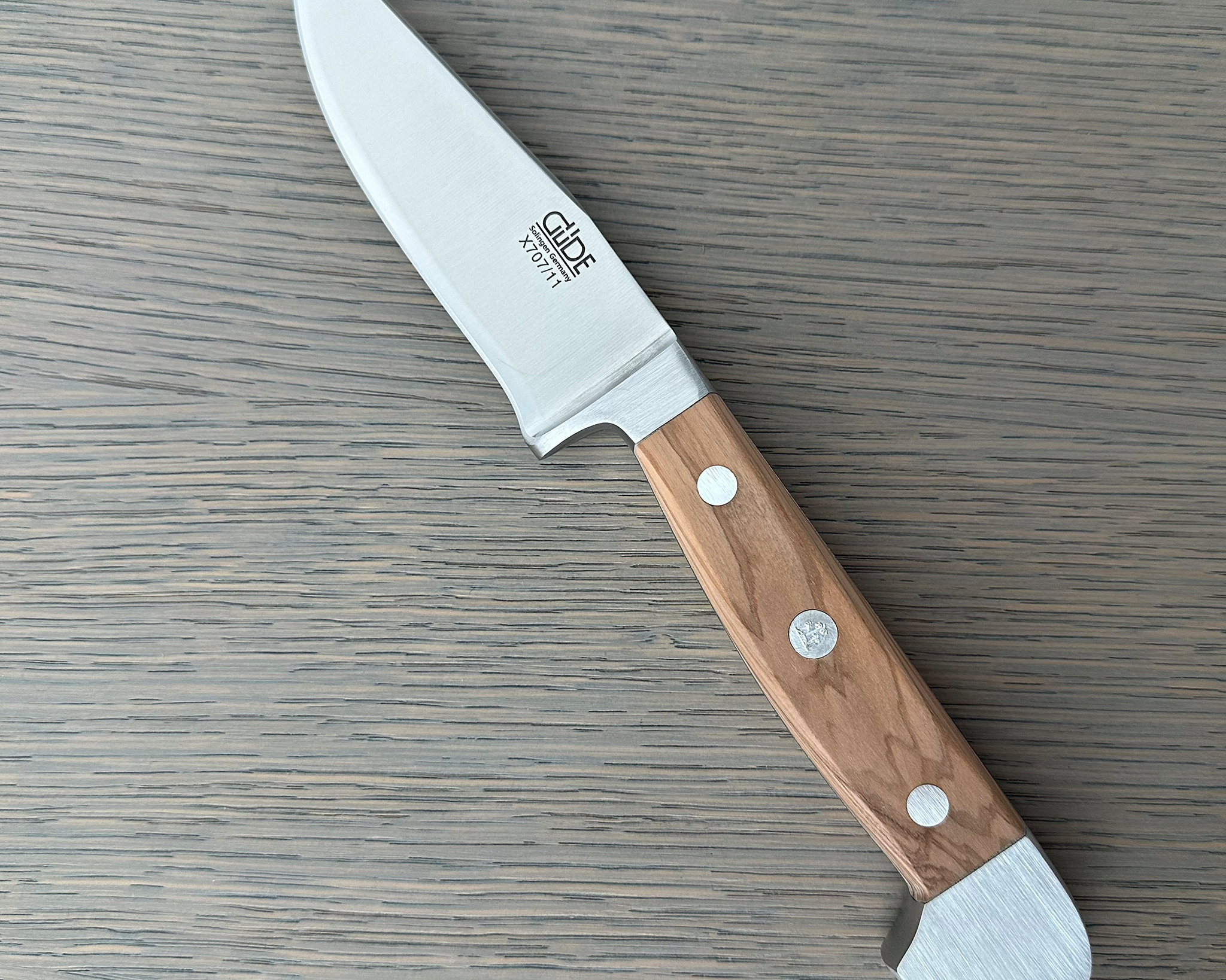 Güde Alpha Olive Series Bavarian Utility Knife 4-inch, forged from a single bar of steel for a harder, thicker blade