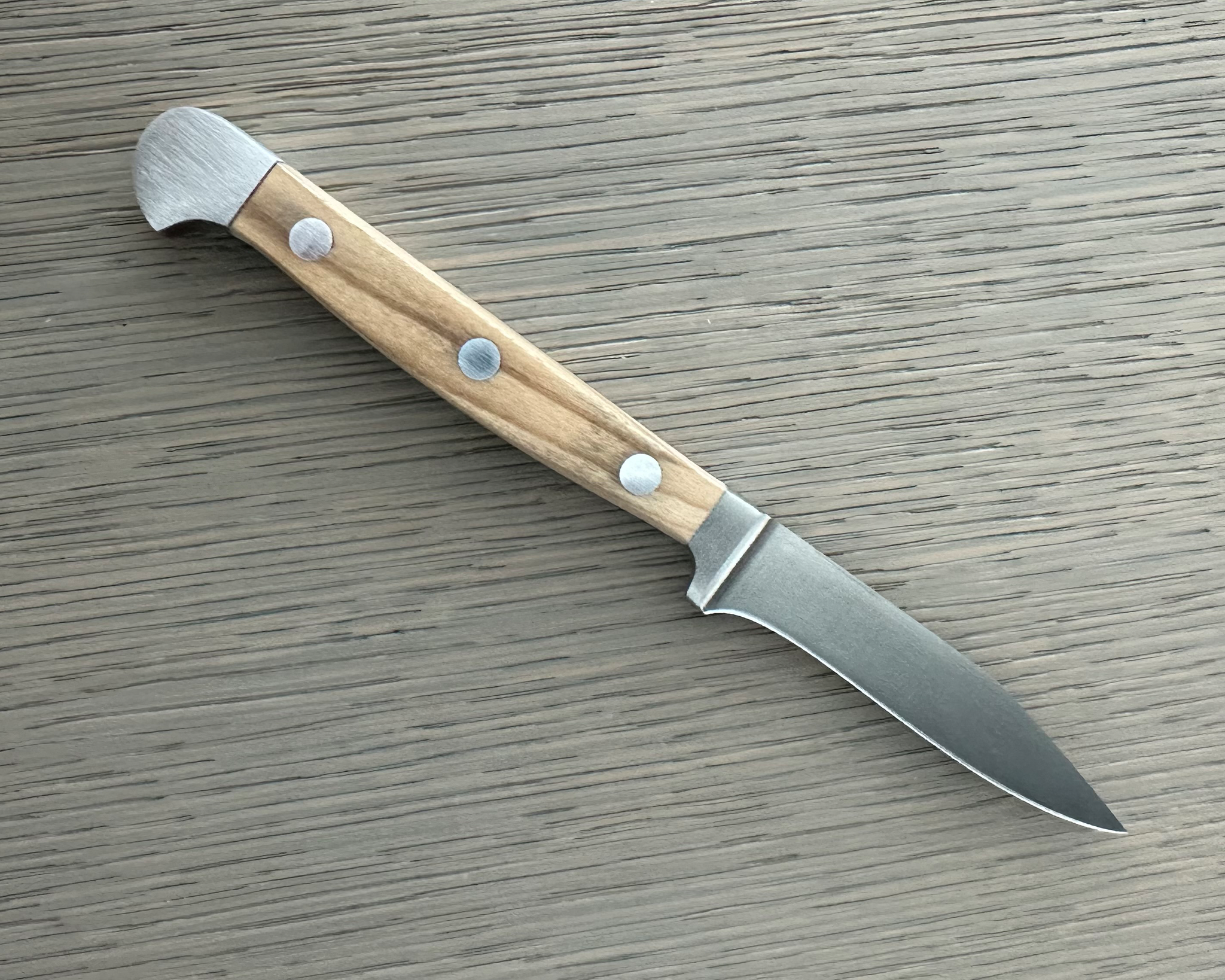 Güde Alpha Olive Series 3-inch sharp point paring knife with olivewood handle