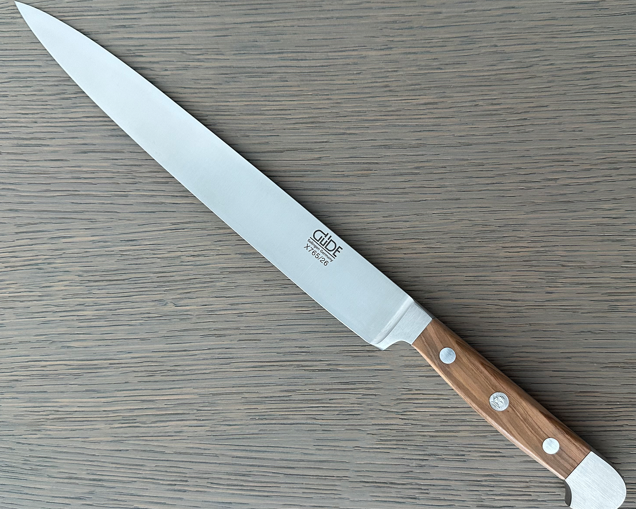 Güde Alpha Olive Slicing Knife 10-in with olive wood handle, hand-forged in Solingen, Germany